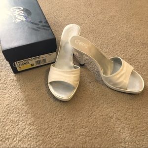 White Carlos Santana heeled sandals.  Size 7